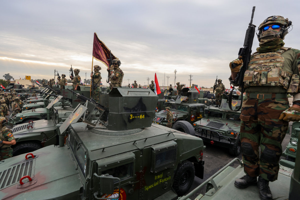 An Iraqi Special Forces unit participate in Army Day celebrations at the Camp Taji military base north Baghdad, on January 6, 2025. (AFP/File)