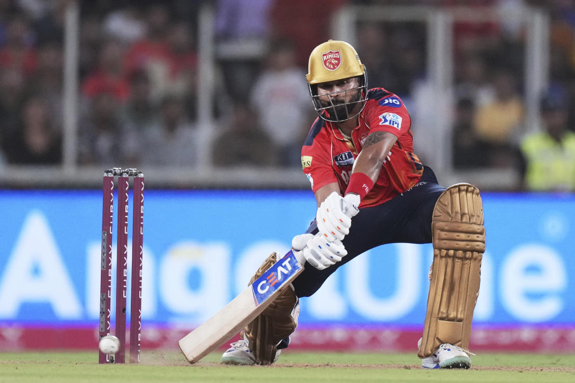 Punjab Kings’ captain Shreyas Iyer plays a shot during the Indian Premier League cricket match between Punjab Kings and Mumbai Indians at Narendra Modi Stadium in Ahmedabad, India. (AP)