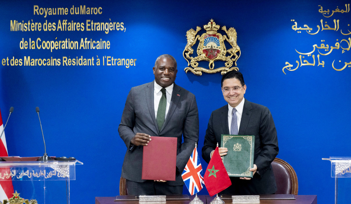 Britain's Foreign Secretary David Lammy (L) and his moroccan counterpart Nasser Bourita sign agreements in Rabat on June 1, 2025. (AFP)