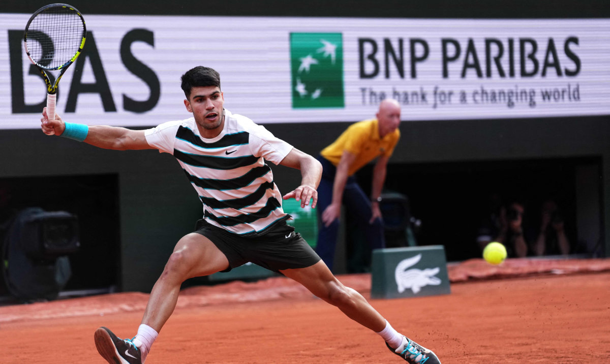 Spain’s Carlos Alcaraz plays a forehand return to US Ben Shelton during their men’s singles match on day 8 of the French Open tennis tournament on Court Philippe-Chatrier at the Roland-Garros Complex in Paris on Sunday. (AFP)