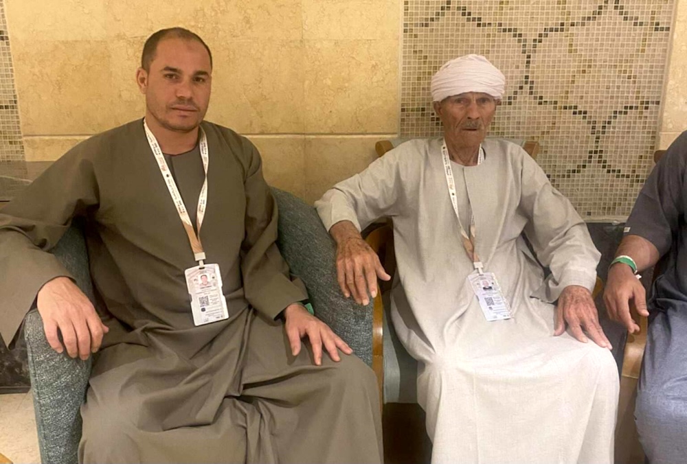 98-year-old Egyptian pilgrim Ahmed Tamim, right, with his son Muhammed. (Supplied)