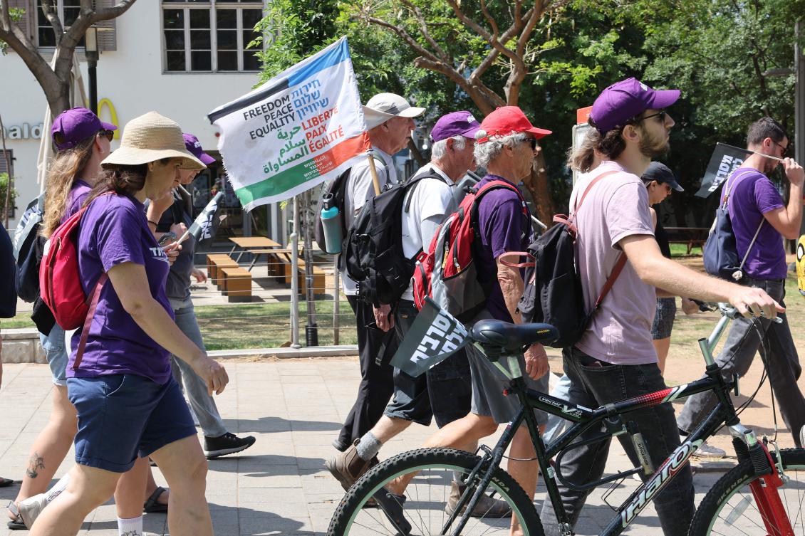 Israeli left wing protesters walk outside the Defense Ministry in Tel Aviv on Jun. 4, 2025, before a three-day march from Tel Aviv to the border with the Gaza Strip demanding for an end to the war in the Gaza Strip. (AFP)