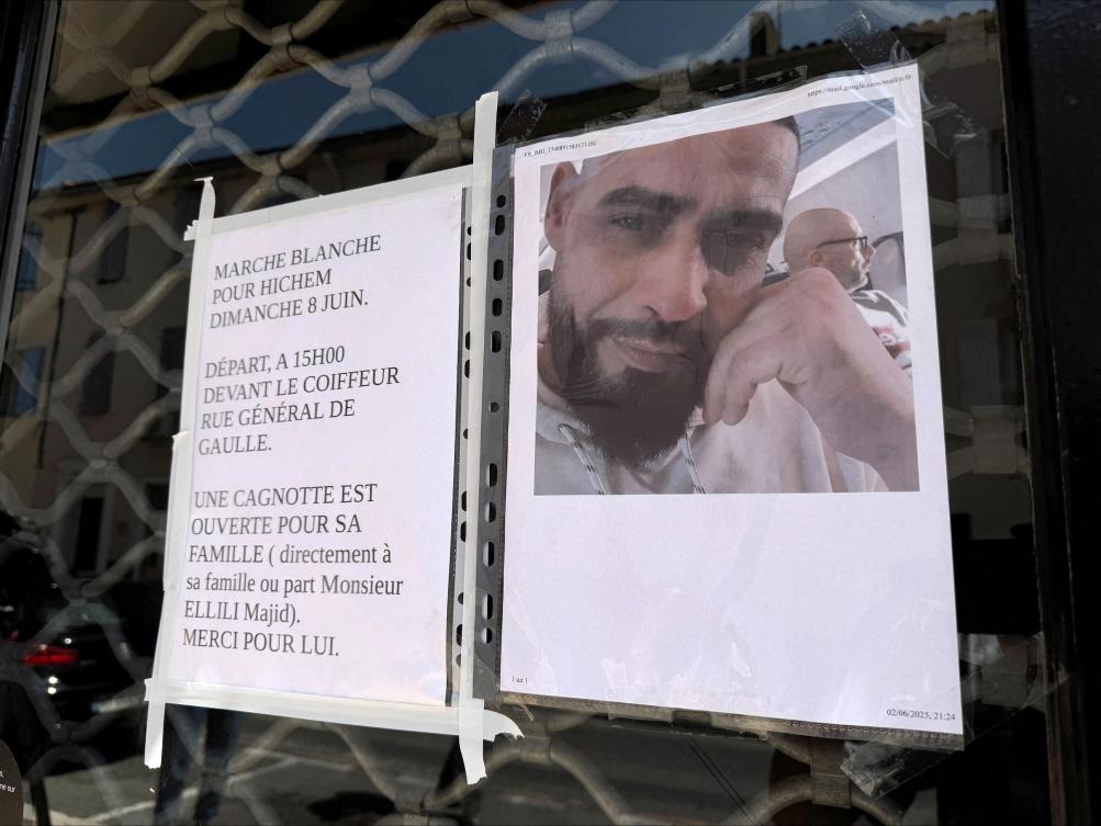 Tributes left to Hichem Miraoui, a Tunisian citizen shot dead by his neighbor in the southern French city of Puget-sur-Argens. (AFP)
