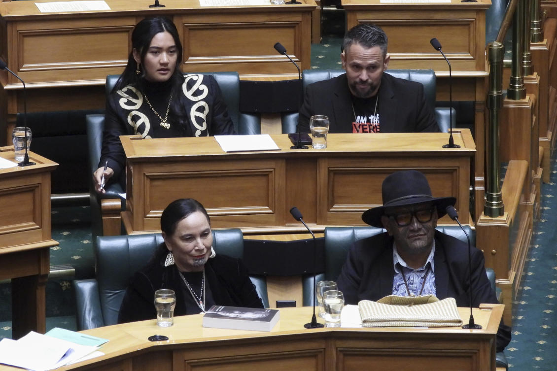 New Zealand lawmakers Hana-Rawhiti Maipi-Clarke, top left, Debbie Ngarewa-Packer, bottom left, and Rawiri Waititi, bottom right, watch as other legislators debate their proposed bans in parliament in Wellington on June 5, 2025. (AP)