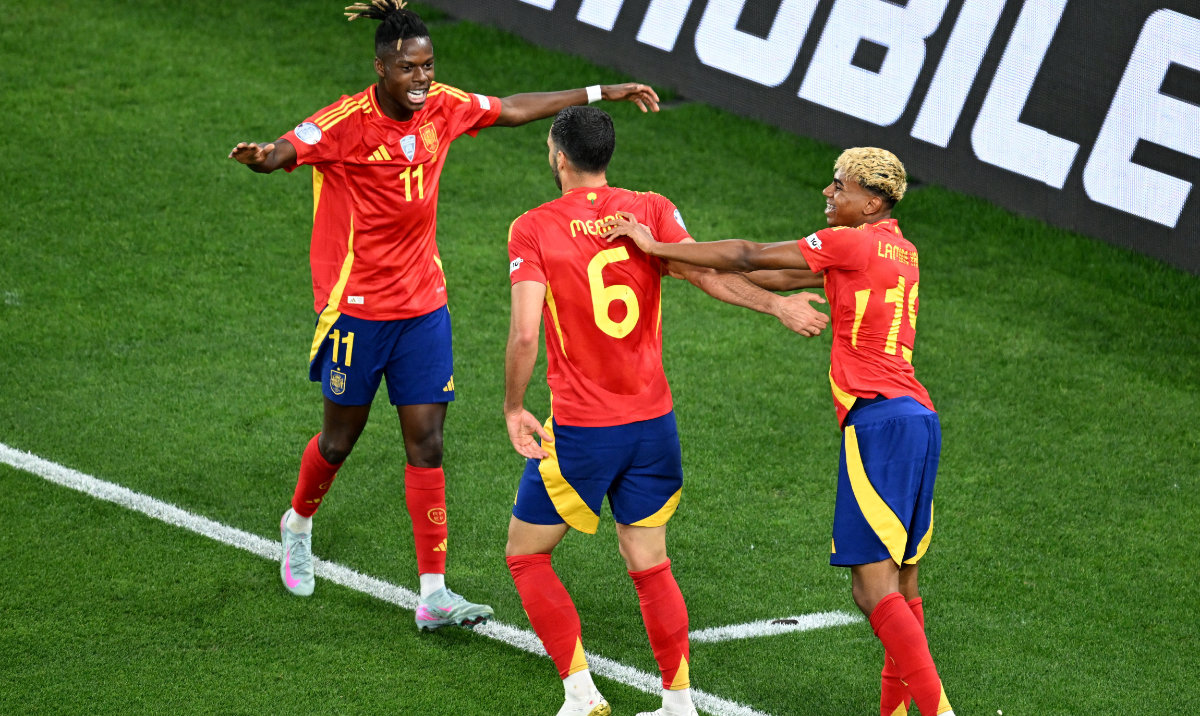 Spain's Mikel Merino celebrates scoring their second goal with Spain's Lamine Yamal and Spain's Nico Williams. (Reuters)