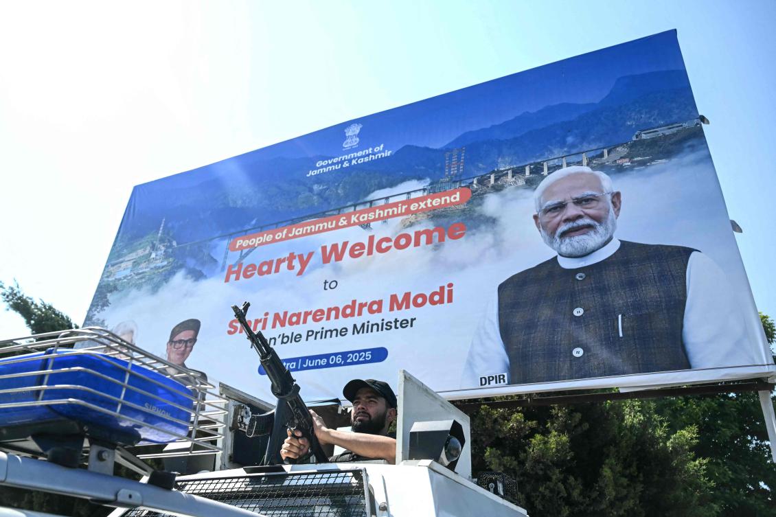 An Indian security personnel keeps watch outside the Srinagar railway station ahead of the inauguration of the Kashmir rail link by the Indian Prime Minister Narendra Modi, in Srinagar on June 6, 2025. (AFP)