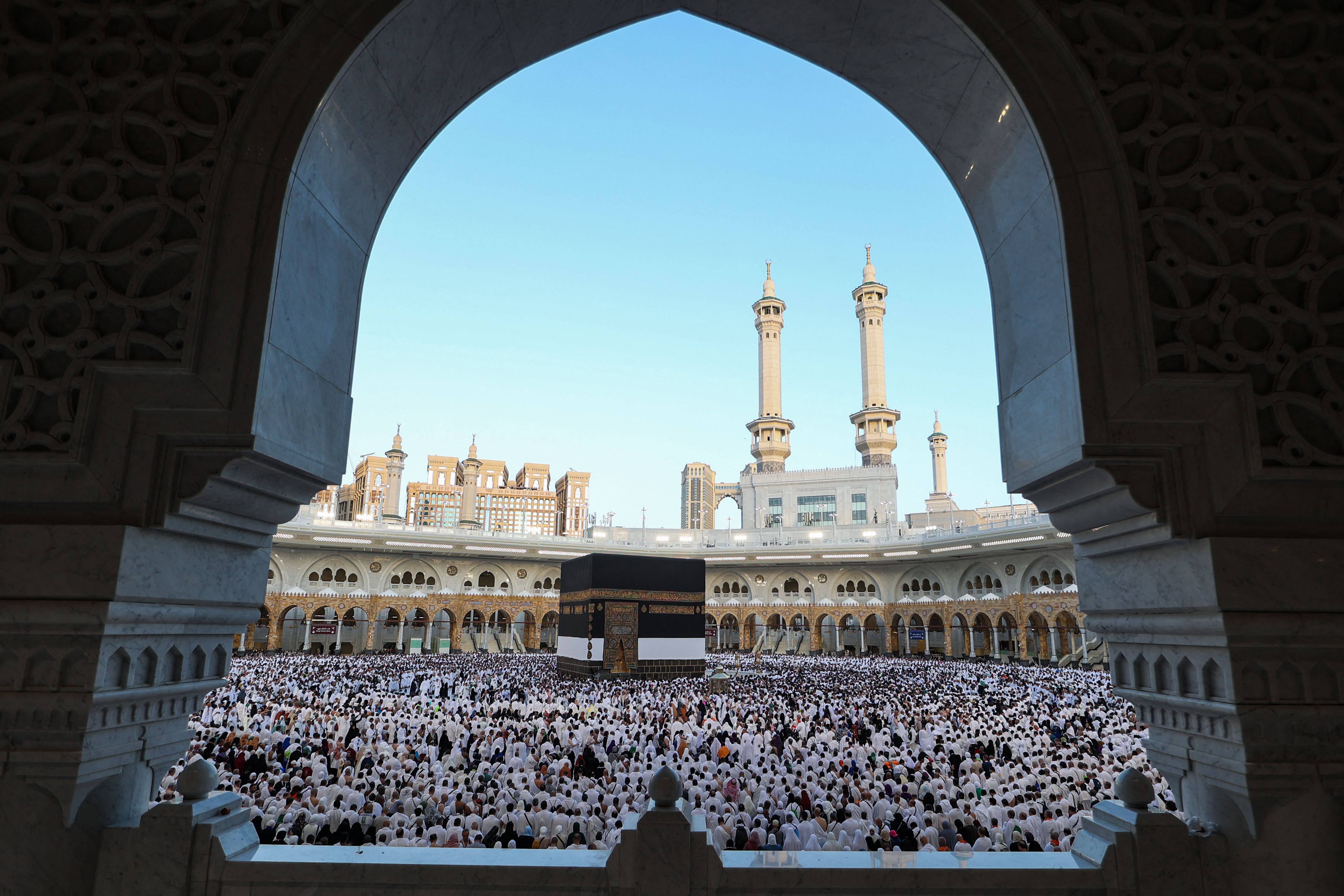 Muslims participate in a special morning prayer around the Kaaba, Islam's holiest shrine, at the Grand Mosque complex in Mecca on June 6, 2025, to mark the start of the Eid al-Adha festival, which marks the end of their Hajj pilgrimage. AFP