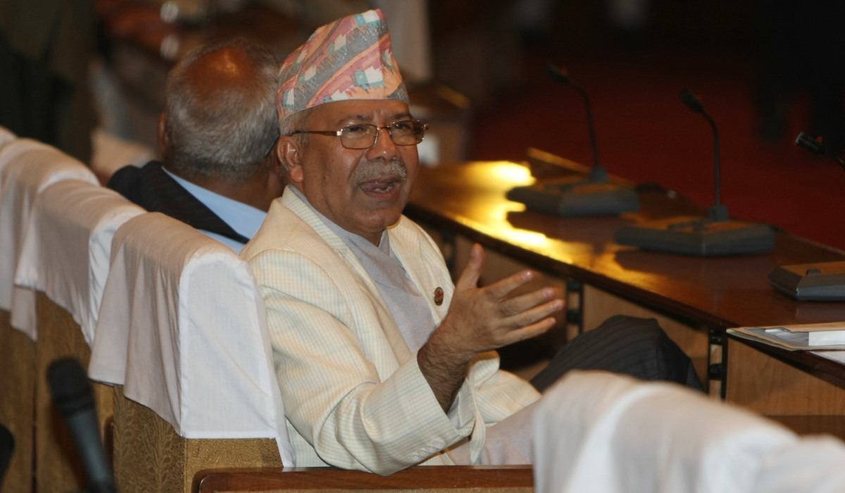 Nepalese caretaker Prime Minister Madhav Kumar Nepal attends parliament during a session to vote for the prime minister's post in Kathmandu on September 26, 2010. (AFP file photo)
