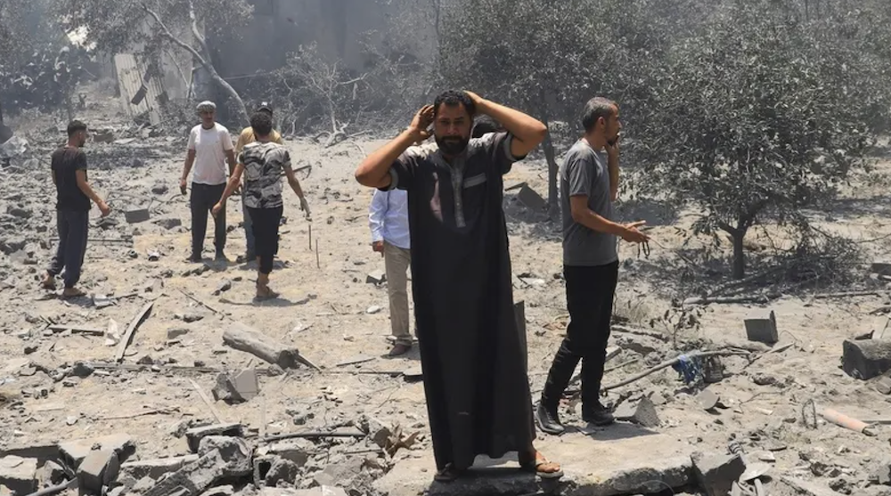 A man reacts at the site of an Israeli strike on a house, in Gaza City, on June 7, 2025. (Reuters)