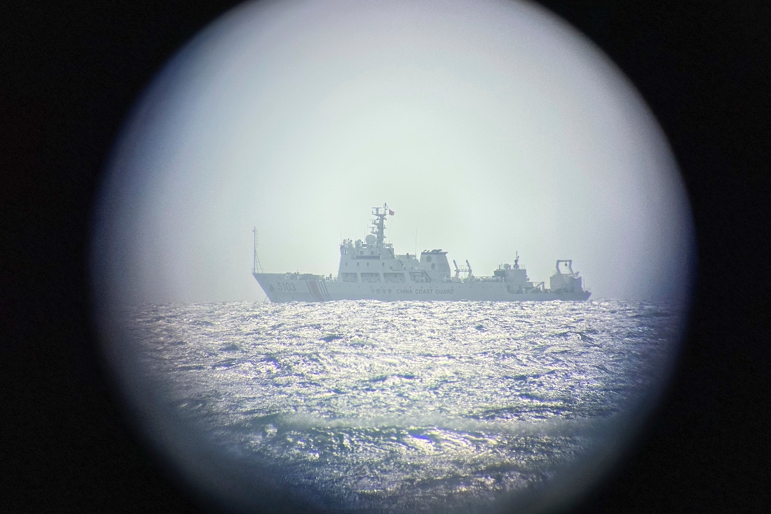 A Chinese guard ship as seen from binoculars on the Philippines occupied Thitu island in the disputed South China Sea. (AP)