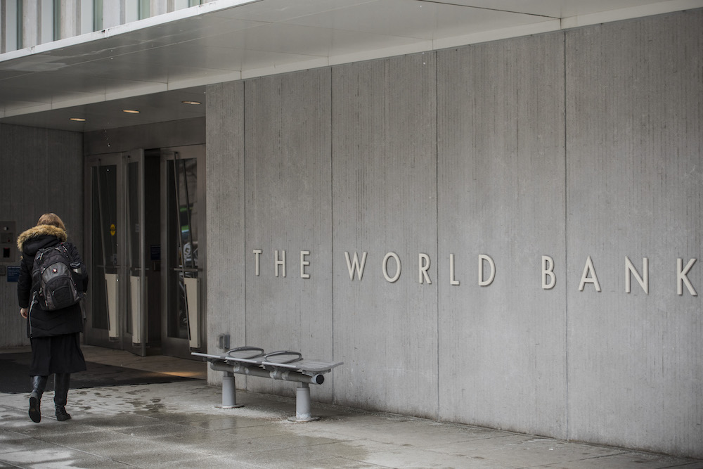 A person enters the building of the Washington-based global development lender, The World Bank Group, in Washington. File/AFP
