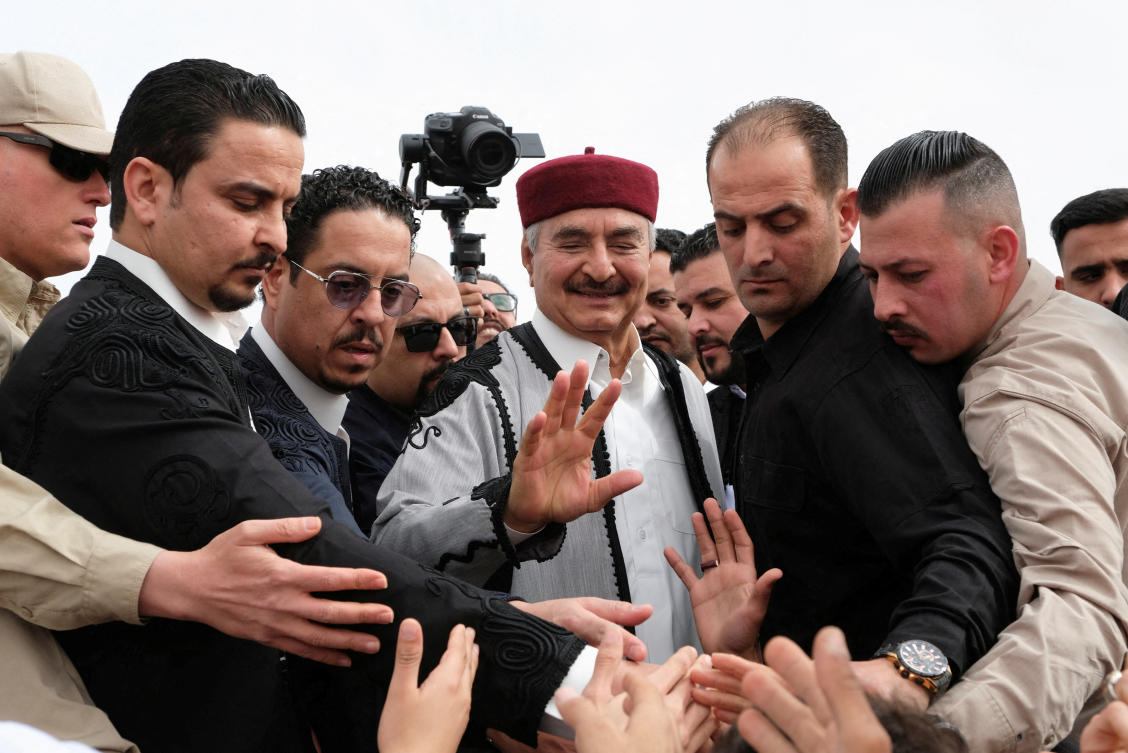 FILE PHOTO: Libyan military commander Khalifa Haftar attends a carnival to celebrate Eid El Fitr in a public square in Benghazi, Libya April 21, 2023. REUTERS/Esam Omran Al-Fetori/File Photo