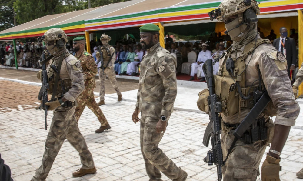 Leader of Mali’s ruling junta Lt. Col. Assimi Goita, center, attends an independence day military parade in Bamako, Mali. (AP/File)
