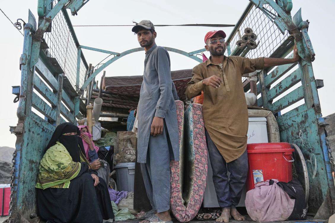 Rights groups and aid agencies say Pakistani authorities are pressuring Afghans into going sooner. (AP)