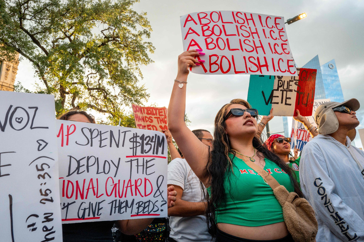 People march against US Immigration and Customs Enforcement (ICE) raids at San Antonio City Hall on June 11, 2025 in San Antonio, Texas. (Getty Images via AFP)