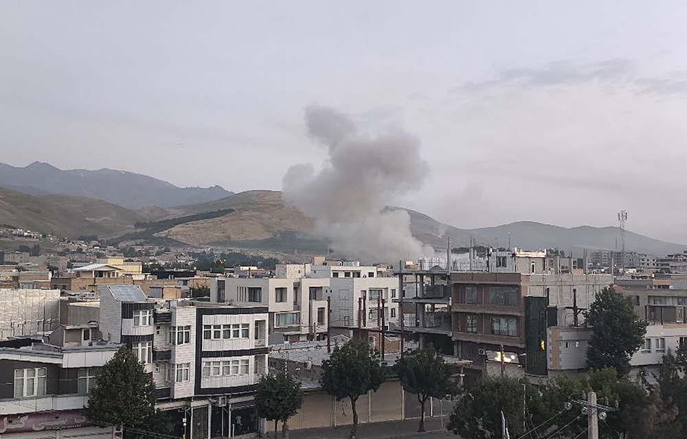 Smoke billows from a site targeted by an Israeli strike in the Iranian capital Tehran early in the morning of June 13, 2025. (Sepah News/AFP)