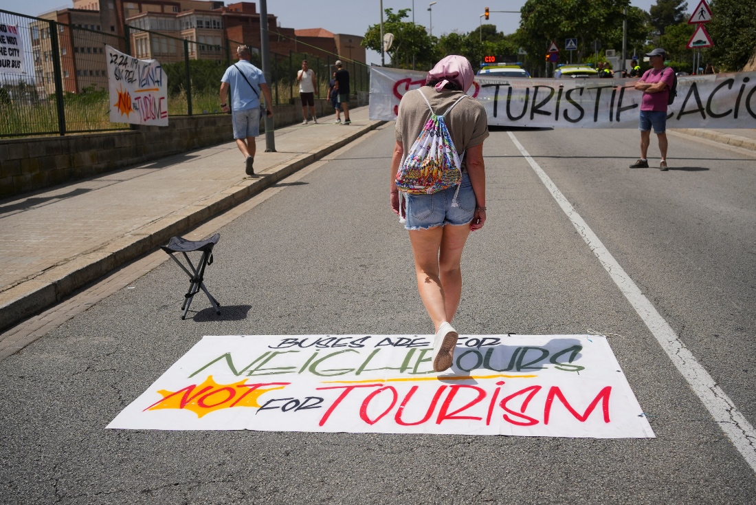 Anti tourism activist at a protest in Spain. (Reuters)