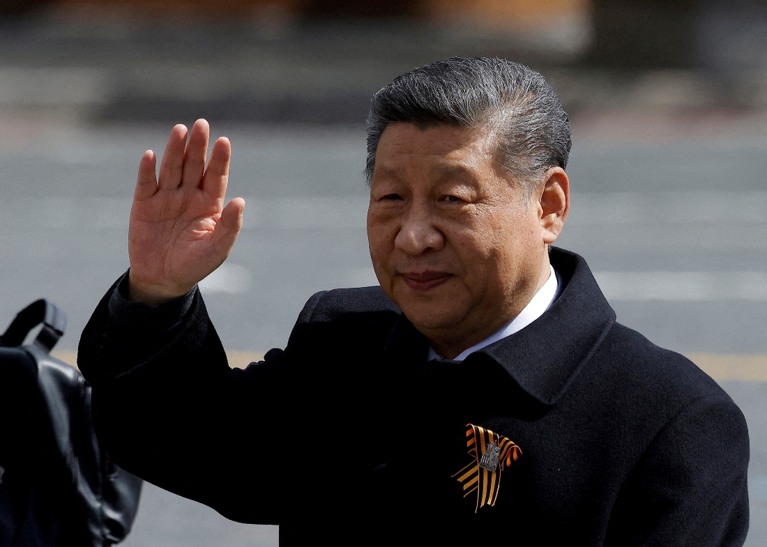Chinese President Xi Jinping waves to spectators as he leaves after a military parade in Moscow, Russia. (Reuters)