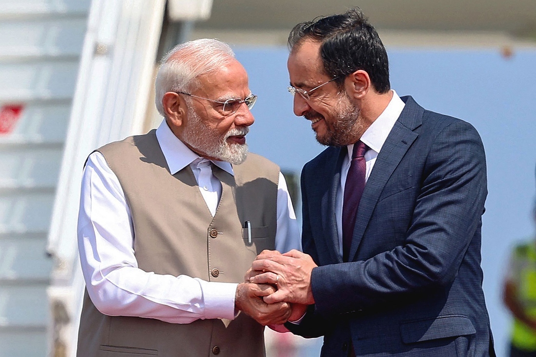 India's Prime Minister Narendra Modi shaking hands with Cyprus' President Nikos Christodoulides upon his arrival at the Larnaca International Airport in Cyprus. (Handout)