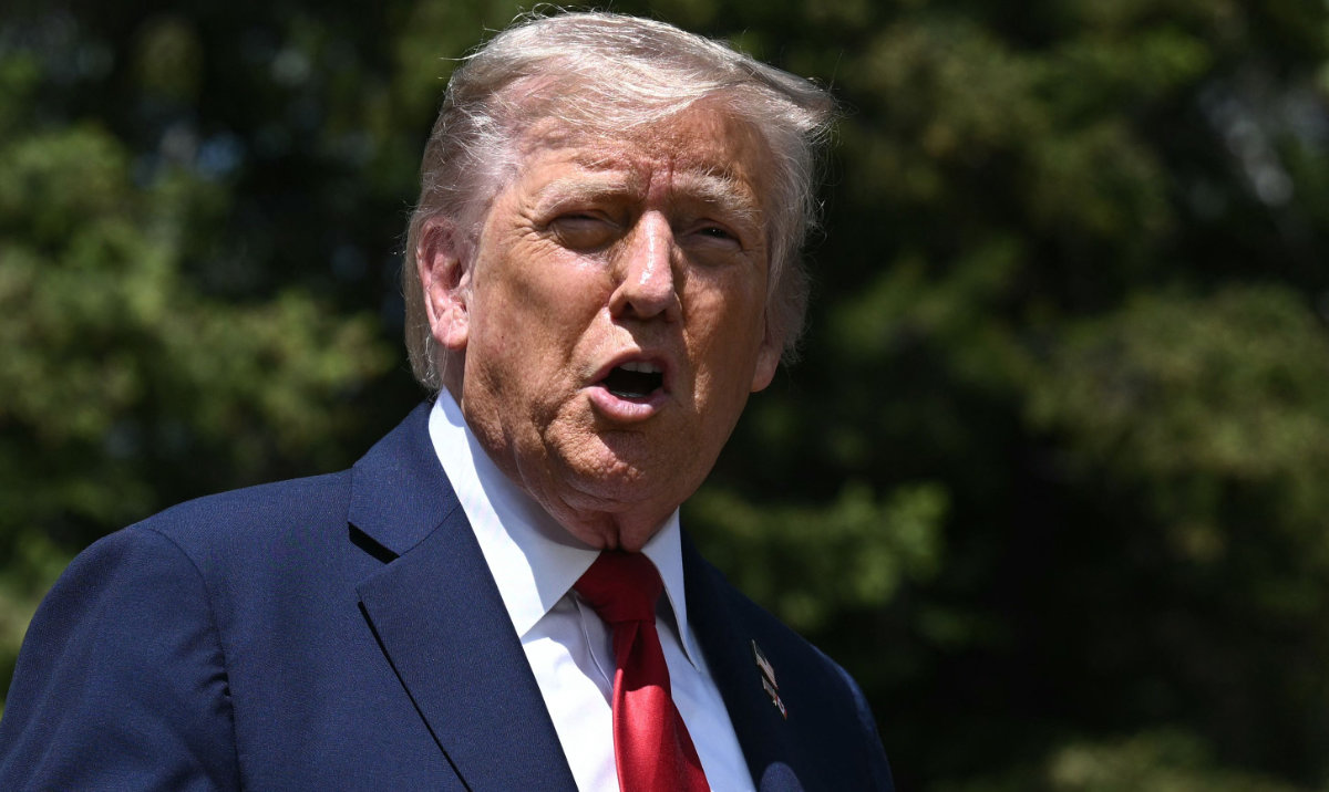 The suit is one of more than 200 filed since January to challenge President Donald Trump’s executive orders. (AFP)