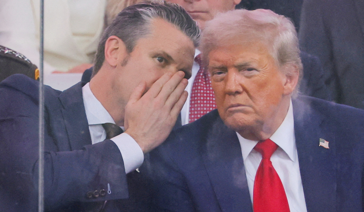 U.S. Secretary of Defense Pete Hegseth talks to U.S. President Donald Trump during the U.S. Army's 250th Birthday parade, on the same day of U.S. President Donald Trump 79th birthday, in Washington, D.C., U.S., June 14, 2025. (REUTERS)