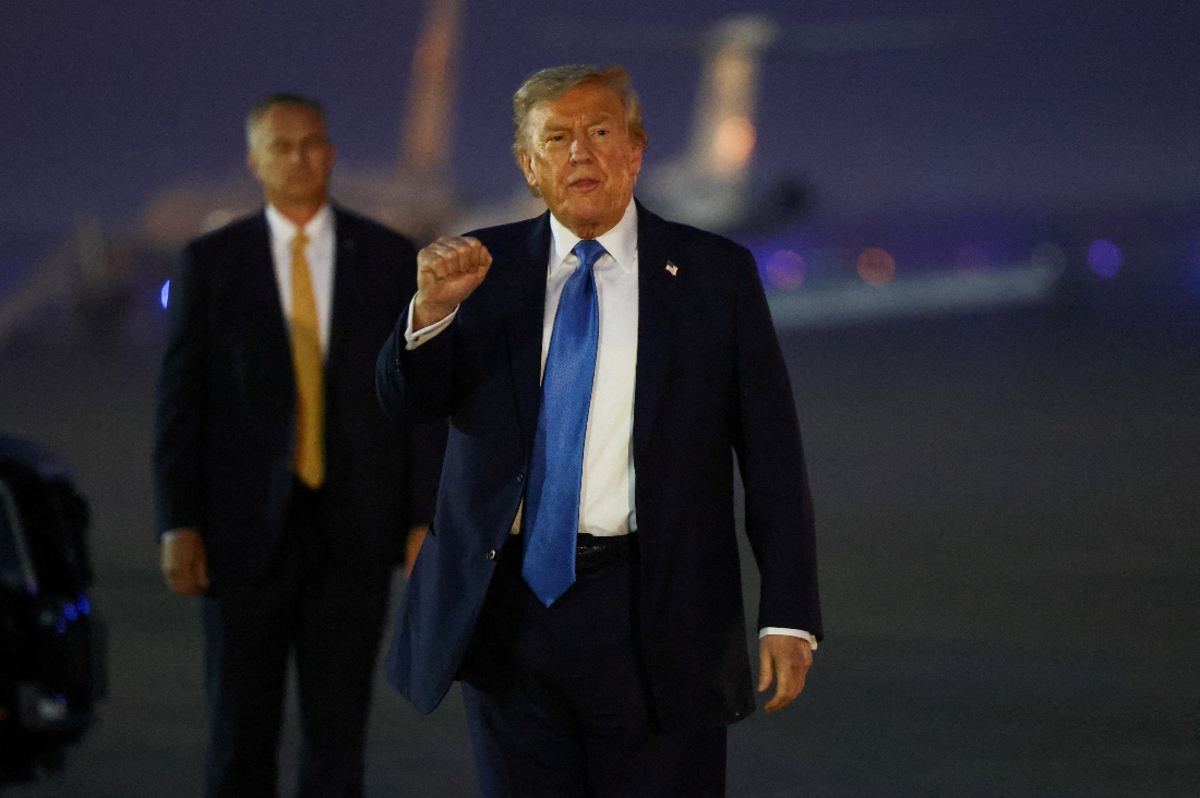 American President Donald Trump gestures after returning early from the G7 Leaders' Summit in Canada, at Joint Base Andrews, Maryland, US. (Reuters)