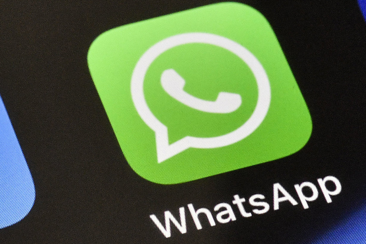 A WhatsApp icon is displayed on an iPhone in Gelsenkirchen, Germany. (AP/File)