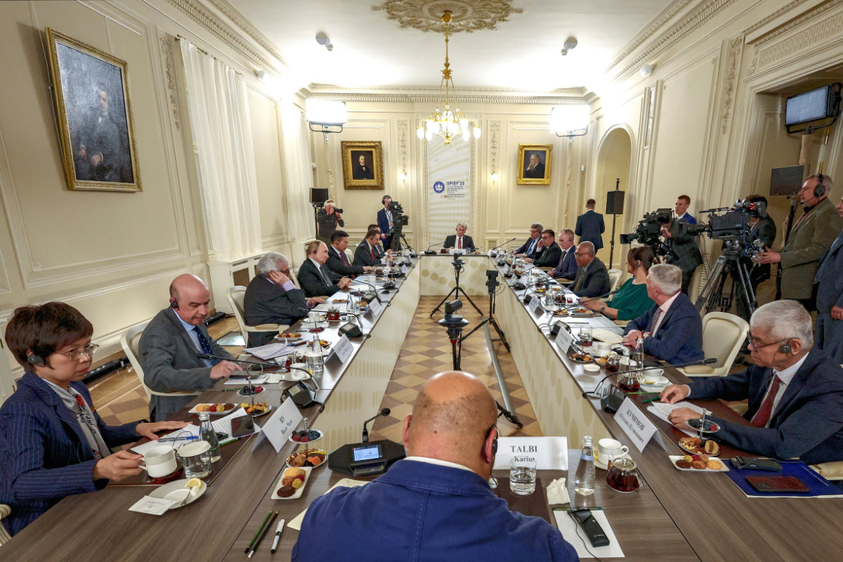 Russian President Vladimir Putin, fourth left, meets with the heads of international news agencies at theSt. Petersburg Rimsky-Korsakov State Conservatory on the sidelines of the St. Petersburg International Economic Forum on June 19, 2025. (Sputnik, Kremlin Pool Photo via AP)