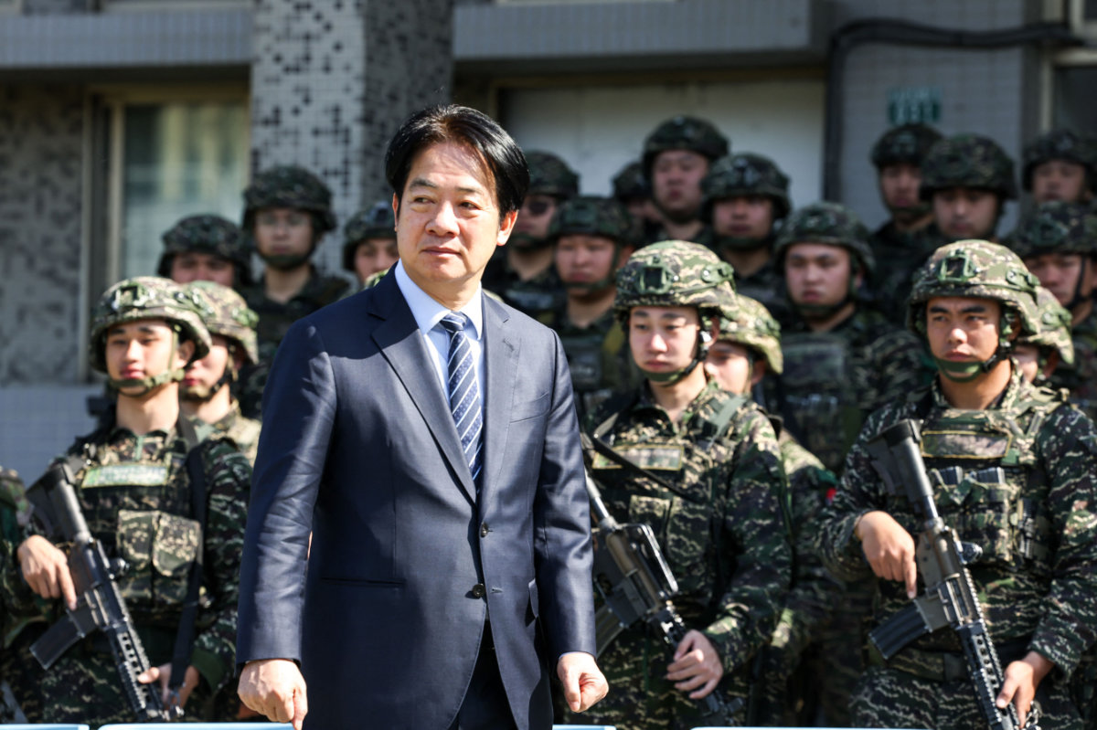 Taiwan's President Lai Ching-te inspects troops taking part in the Rapid Response Exercise during a visit at the Songshan military airbase in Taipei on March 21, 2025. (AFP)