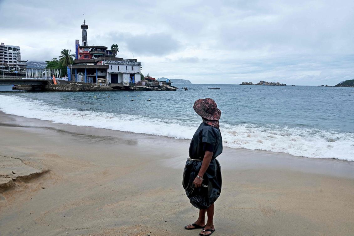 Hurricane Erick killed at least two people as it swept through southern Mexico causing significant damage to coastal communities before weakening to a low-pressure system Thursday night. (AFP)