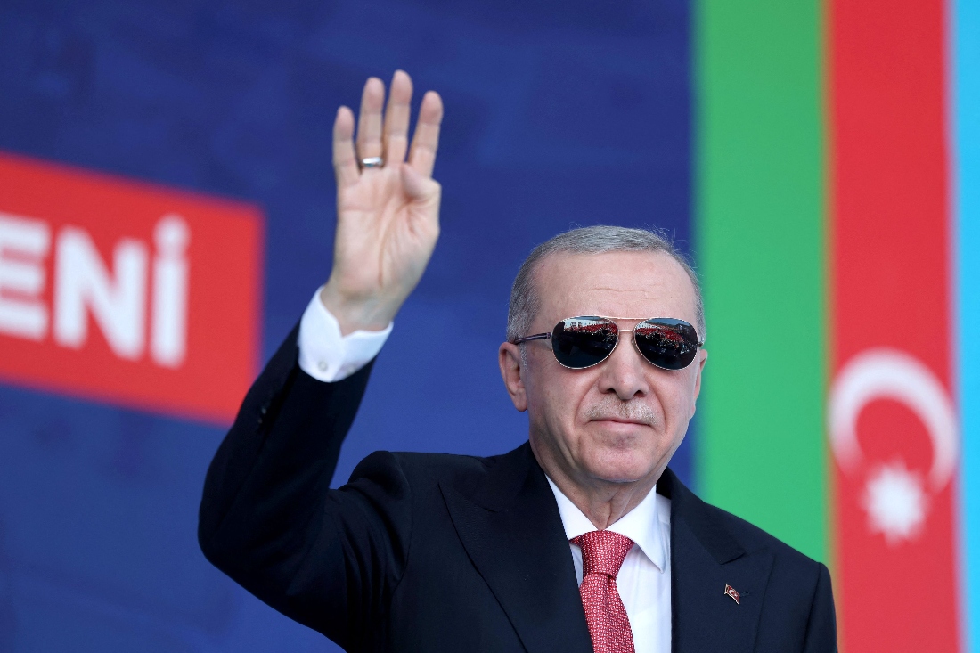 Turkish President Recep Tayyip Erdogan greeting supporters during the ceremony of the 250 thousand's post-quake houses in Kahramanmaras. (Handout by Turkish Presidency Press Office)