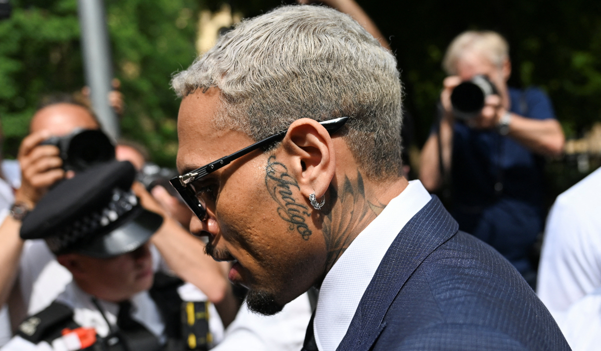 U.S. singer Chris Brown, who has been charged with inflicting grievous bodily harm in what prosecutors said was an "unprovoked attack" on a music producer at the Tape nightclub in central London in 2023, walks outside Southwark Crown Court in London, Britain, June 20, 2025. (REUTERS)