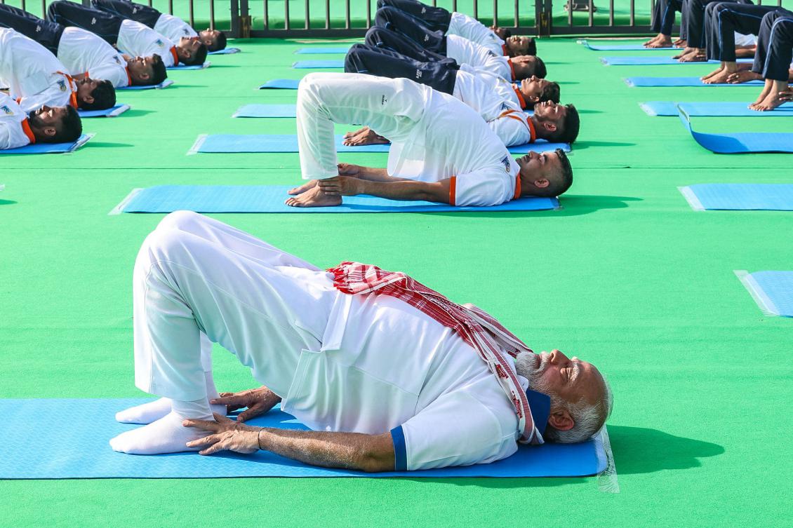 Indians stretch, breathe and balance to mark International Day of Yoga