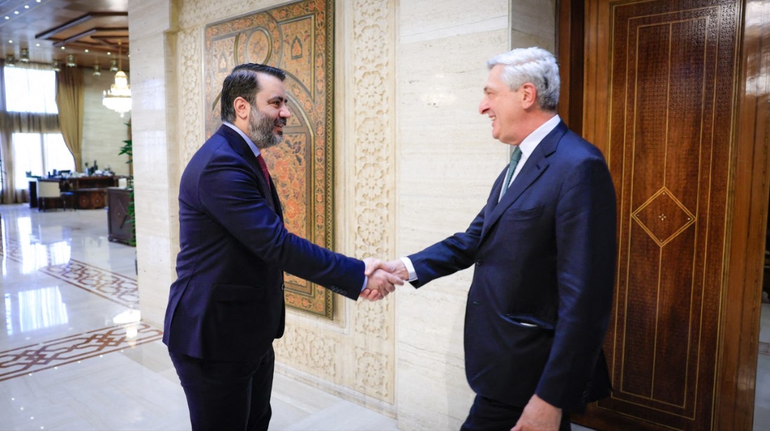 Syrian Foreign Minister Assaad Al Shaibani welcomes UN High Commissioner for Refugees Filippo Grandi in Damascus, Syria. (SANA Handout)
