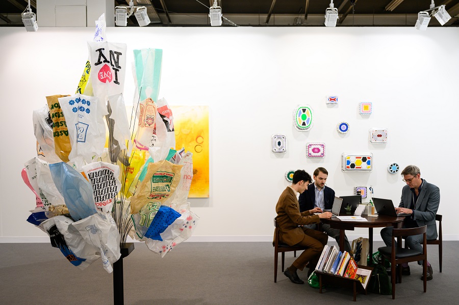 Gallerists work next to artworks of B. Wurtz displayed at Art Basel at Messe Basel on June 18, 2025 in Basel, Switzerland. (Getty Images)