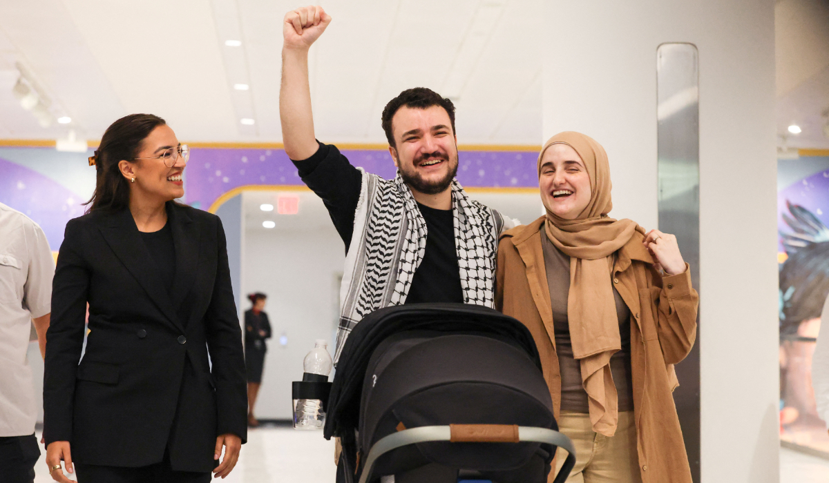 Columbia University graduate student Mahmoud Khalil gestures next to his wife Dr. Noor Abdalla and U.S. Rep. Alexandria Ocasio-Cortez (D-NY) at Newark airport, a day after he was released from immigration custody, in Newark, New Jersey, U.S., June 21, 2025. (REUTERS)