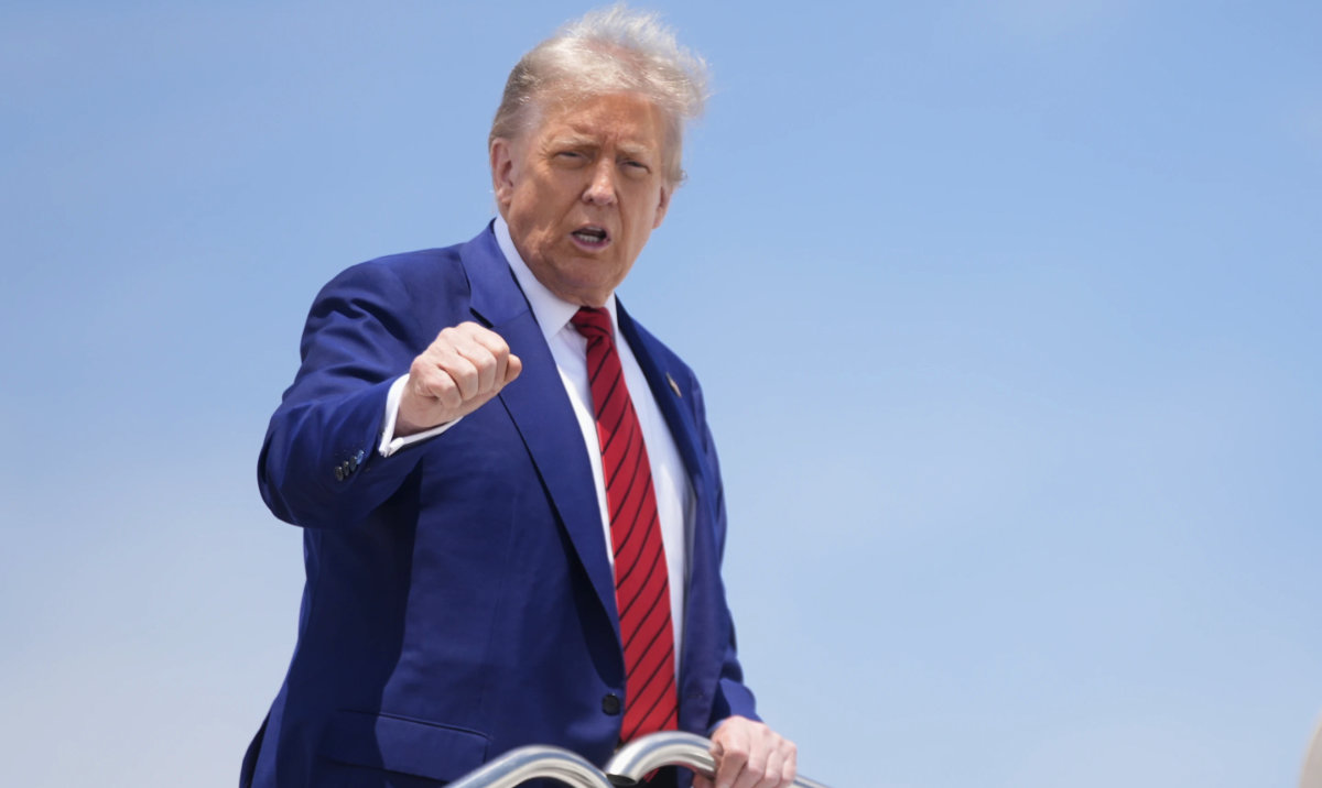 President Donald Trump gestures as he boards Air Force One at Joint Base Andrews, Md., June 20, 2025. (AP)