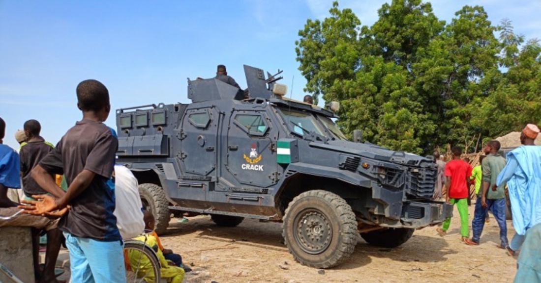 Armored vehicle seen in the Zabarmari district, near Maiduguri, on November 6, 2023, during a burial of farmers that were victims of an attack in Nigeria. (AFP)