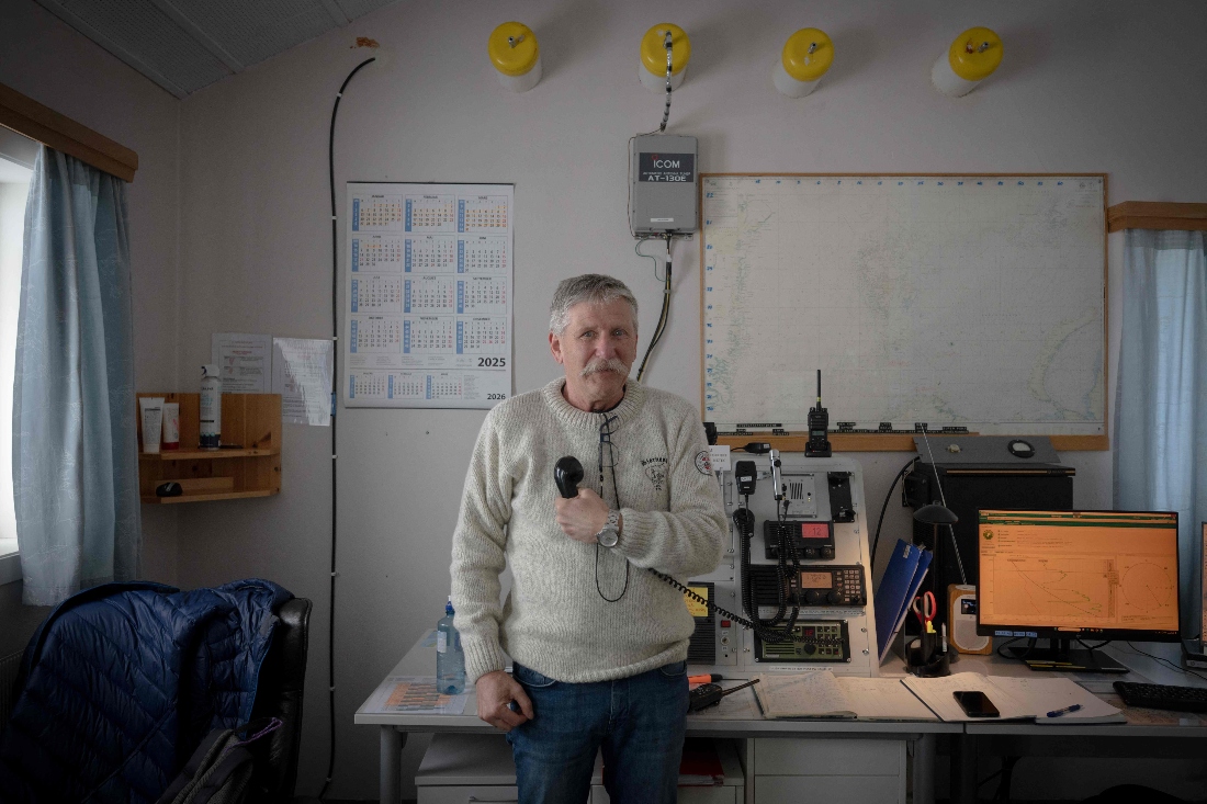 Norwegian meteorologist Trond Robertsen poses in the weather forecast room in the weather station on the North Coast of remote Norwegian territory Bear Island. (AFP)
