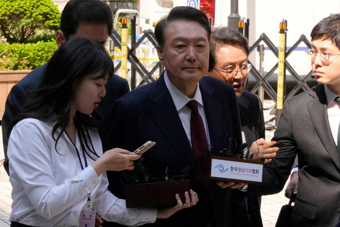 South Korea’s ousted President Yoon Suk Yeol arrives to attend his trial at the Seoul Central District Court in Seoul on May 12, 2025. (Reuters)