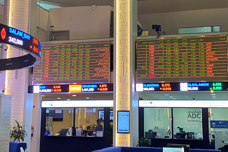 Electronic boards showing stock information are pictured at the stock market in Dubai, UAE. File/Reuters