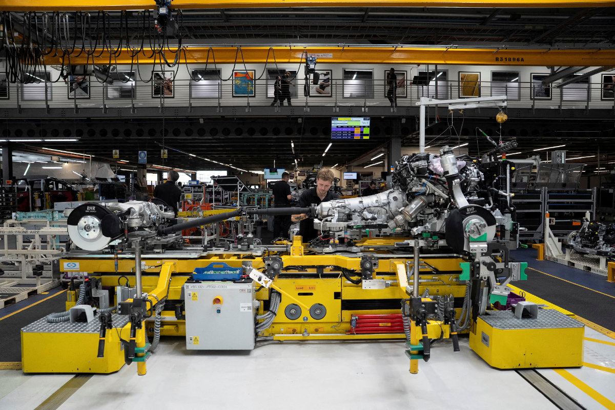 Technicians work on a Rolls-Royce engine prior to it being installed in a car on the production line of the Rolls-Royce Goodwood factory, near Chichester, Britain. (REUTERS/File Photo)