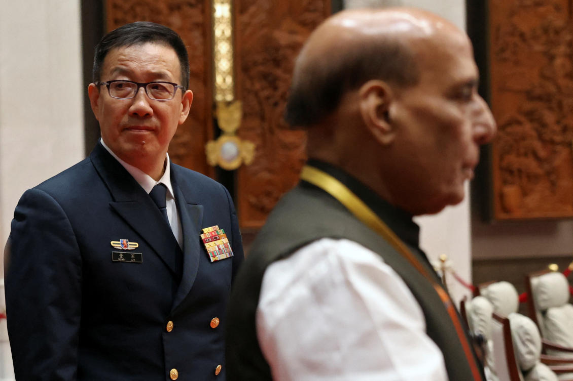 Chinese Defense Minister Dong Jun, left, and India’s Defense Minister Rajnath Singh visit a meeting hall at the Shanghai Cooperation Organization Defense Ministers’ Meeting in Qingdao, Shandong province, China on June 26, 2025. (Reuters)