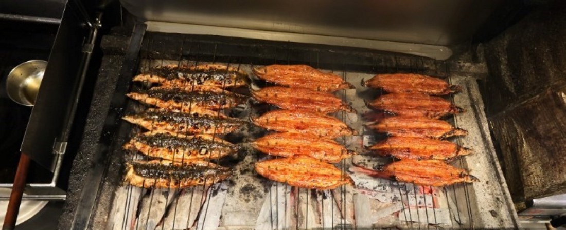 Eels grilled at an eel restaurant in Osaka, Japan. (AFP)