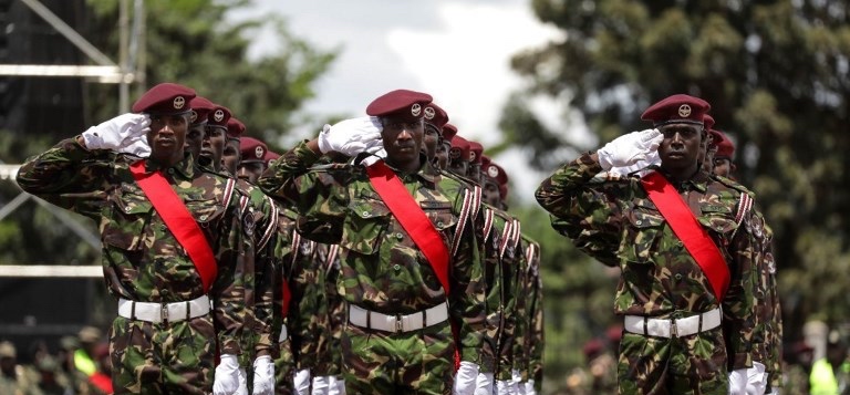 Uganda Special Forces presenting a creative drill at the Chief of Defense Forces Inter Force Drill Competition in Kampala, Uganda. (AFP)