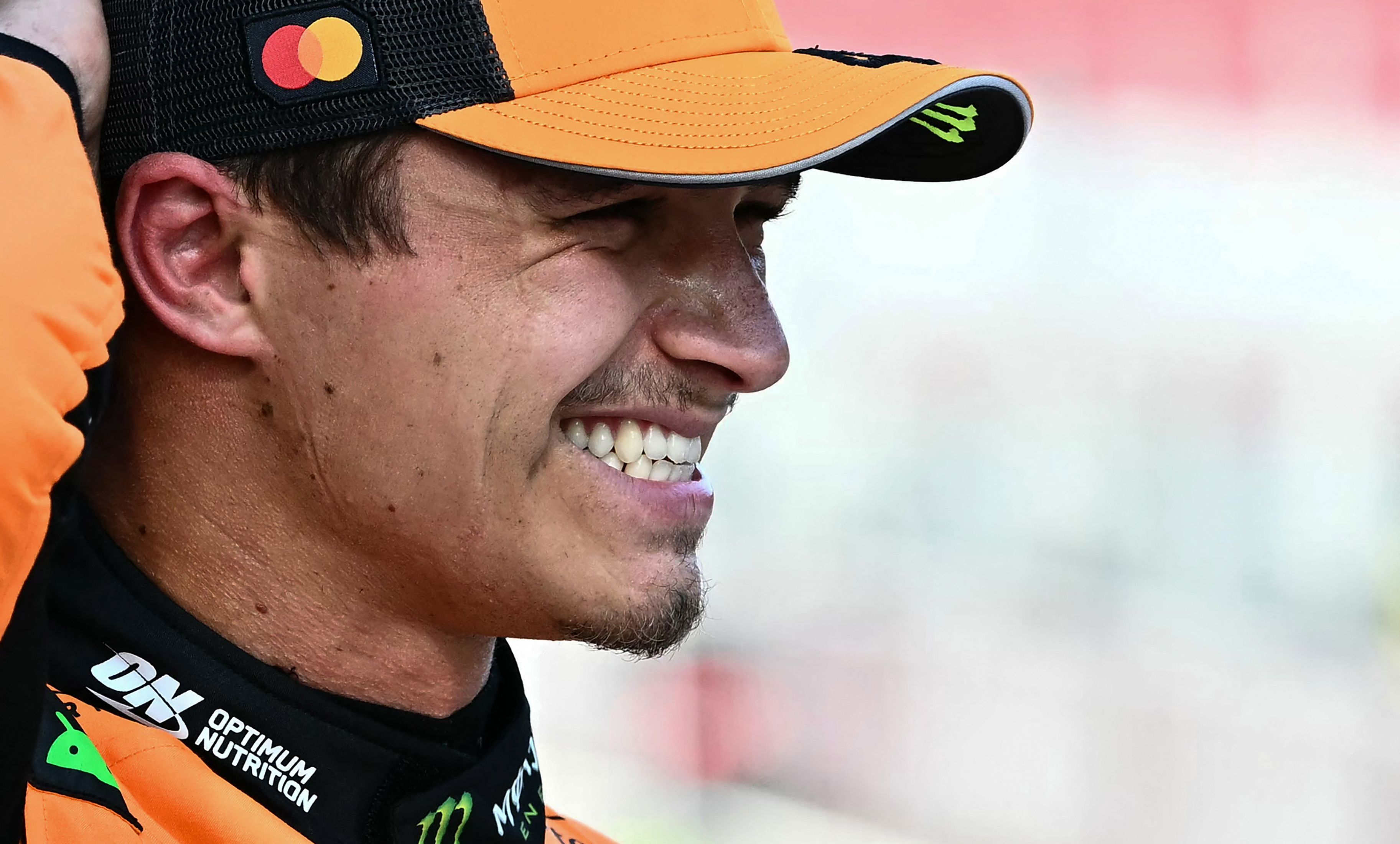Pole position winner McLaren's British driver Lando Norris celebrates after the qualifying session at the Red Bull Ring race track in Spielberg, Austria, on June 28, 2025, ahead of the Formula One Austrian Grand Prix. (AFP)