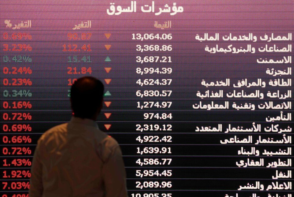 An investor monitors a screen displaying stock information at the Saudi Stock Exchange (Tadawul) in Riyadh, Saudi Arabia. File/Reuters