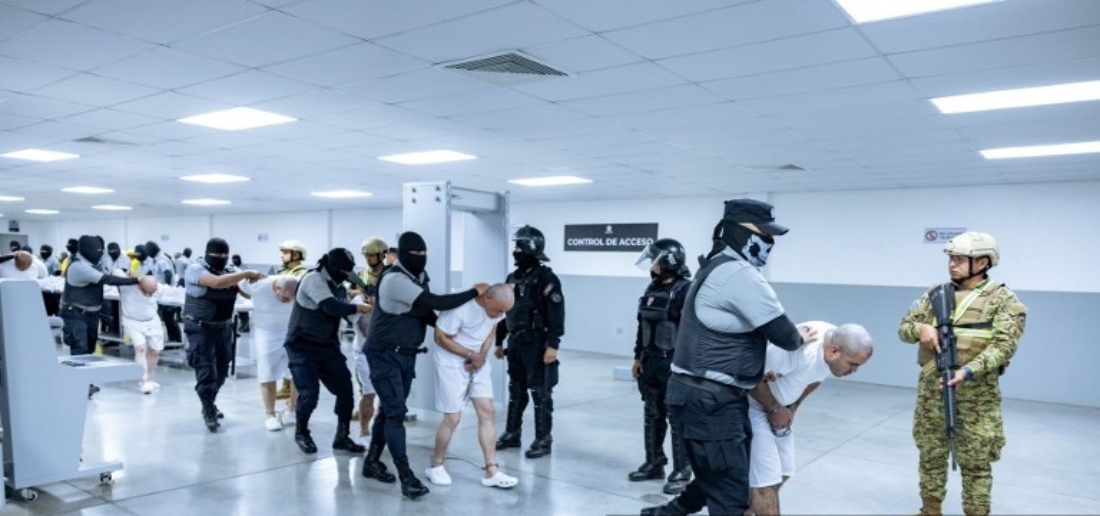Handout photo shows members of the Venezuelan criminal organization Tren de Aragua and from the Salvadoran gang MS-13 being subdued upon their arrival at the Terrorism Confinement Center in El Salvador. (AFP)