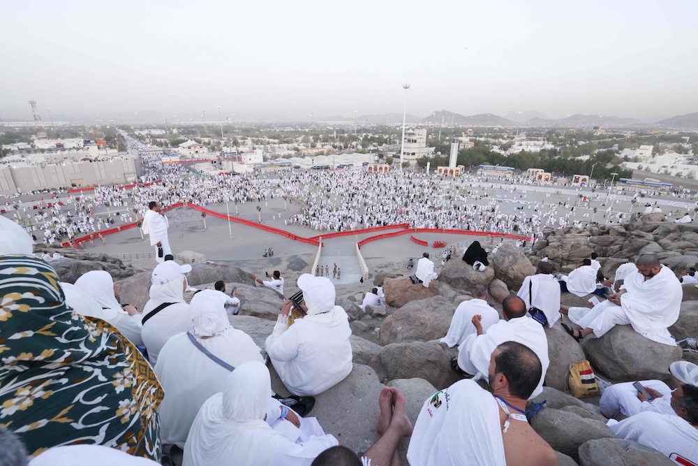 Muslims offer prayers on top of Mount Arafat during the annual Hajj pilgrimage on June 5, 2025. (AFP)