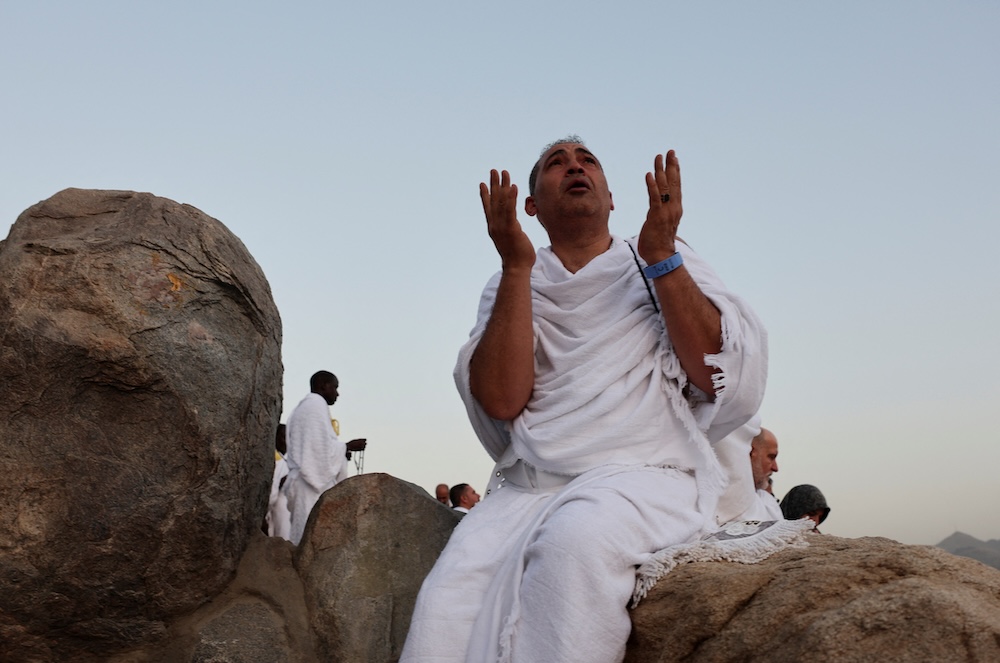 Pilgrims pray at Mount Arafat during the annual Hajj pilgrimage on June 5, 2025. (Reuters)